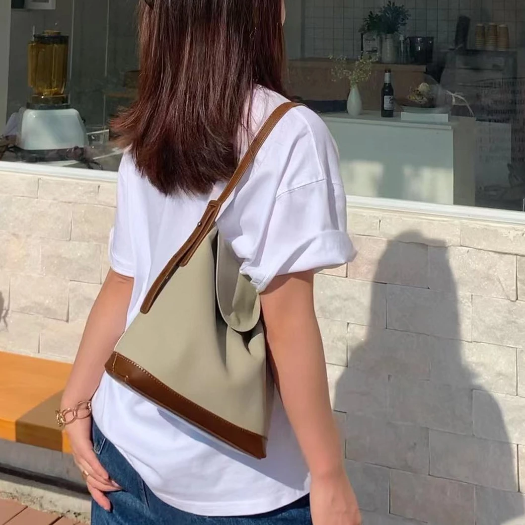 【芝麻集】SK-91752-1浅滩银珠RAIN.CUN夏季新款腋下斜跨轻奢女包