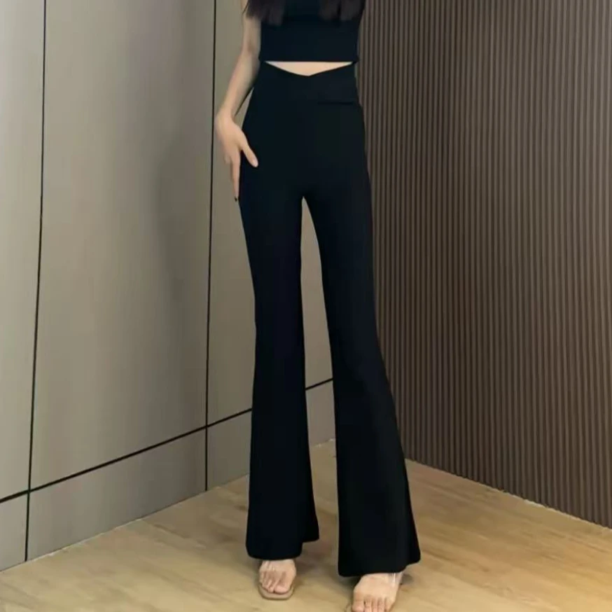 【秀宝女装】高腰设计感魔术贴显瘦休闲喇叭小黑裤XB4080