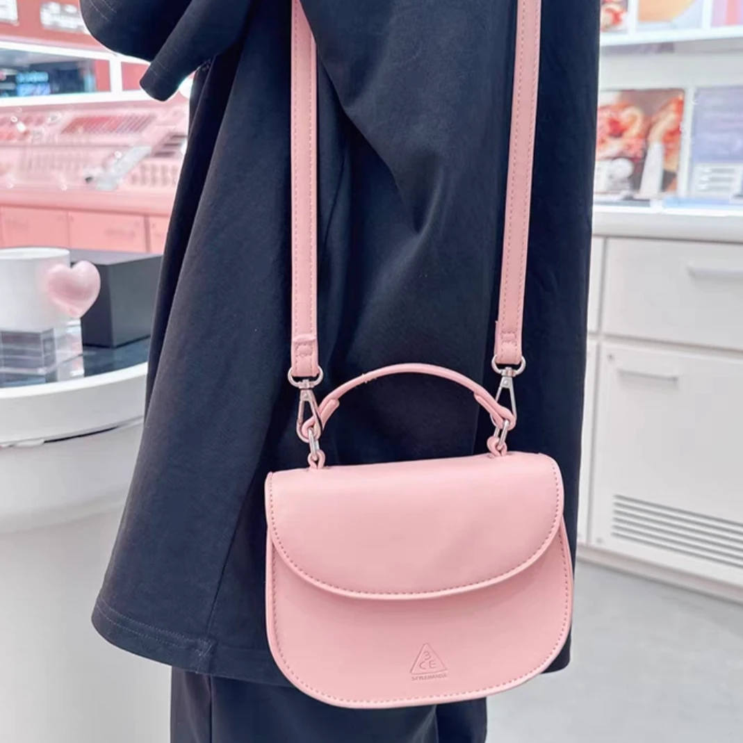 3CE【K137】粉色手拎斜挎包 简约时尚纯色化妆包收纳女包