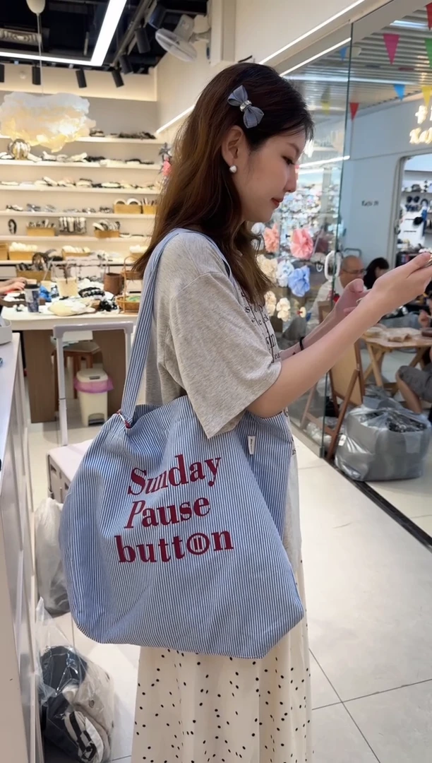 蓝色条纹字母包包