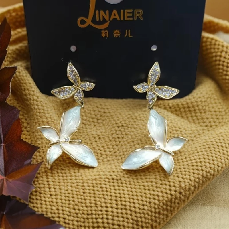 925银仿珍珠耳饰 浅金色日韩小蝴蝶拼色耳环优雅素款欧若智性风