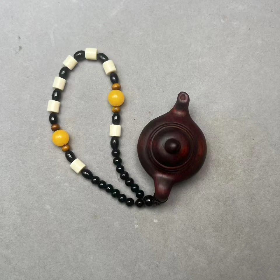 A55紫檀把把壶把件