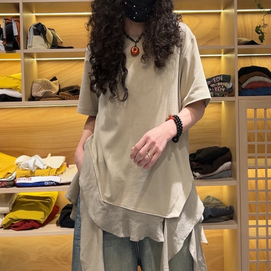 65389春夏个性时尚设计感百搭显瘦不规则拼接短袖上衣