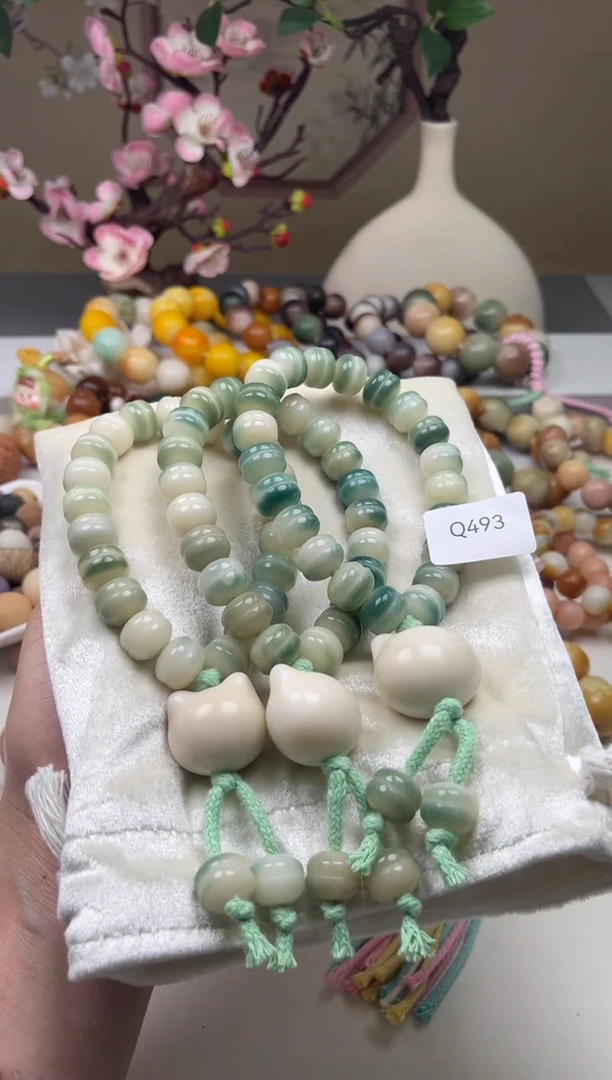 白玉菩提吊坠瑕WQ493蛋堡手持13mm一串随机