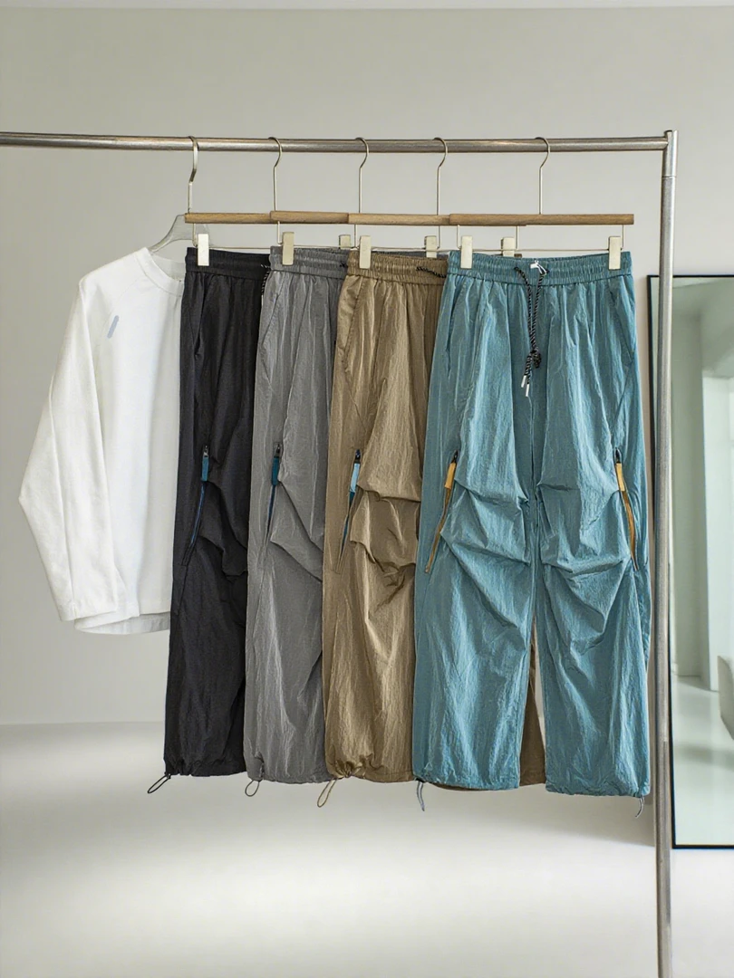 轻奢机能美学金属尼龙双层透气情侣户外登山休闲徒步冲锋裤休闲裤