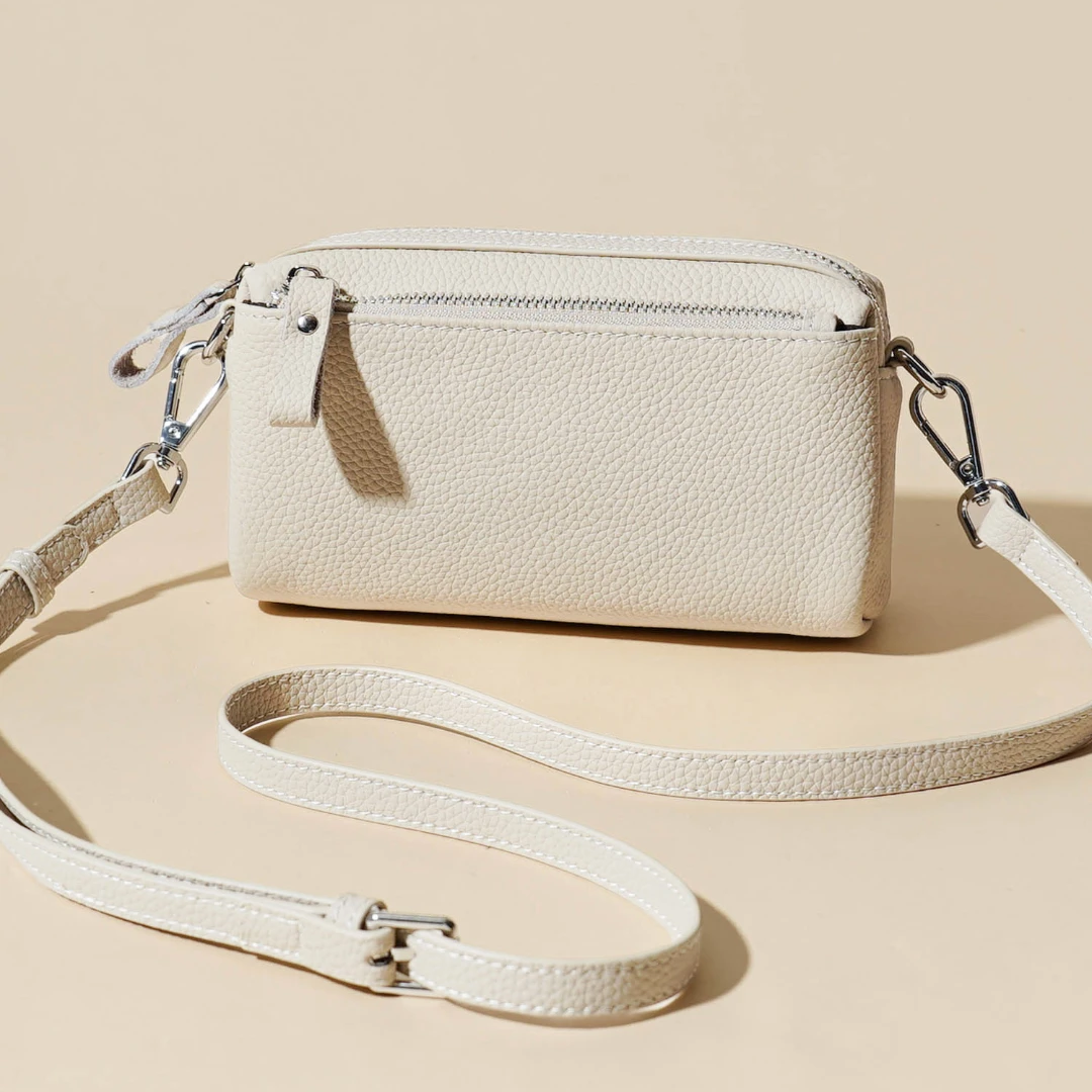 岩牛休闲真皮夏季简约女士小金砖潮流小包包轻便肩包YN3287