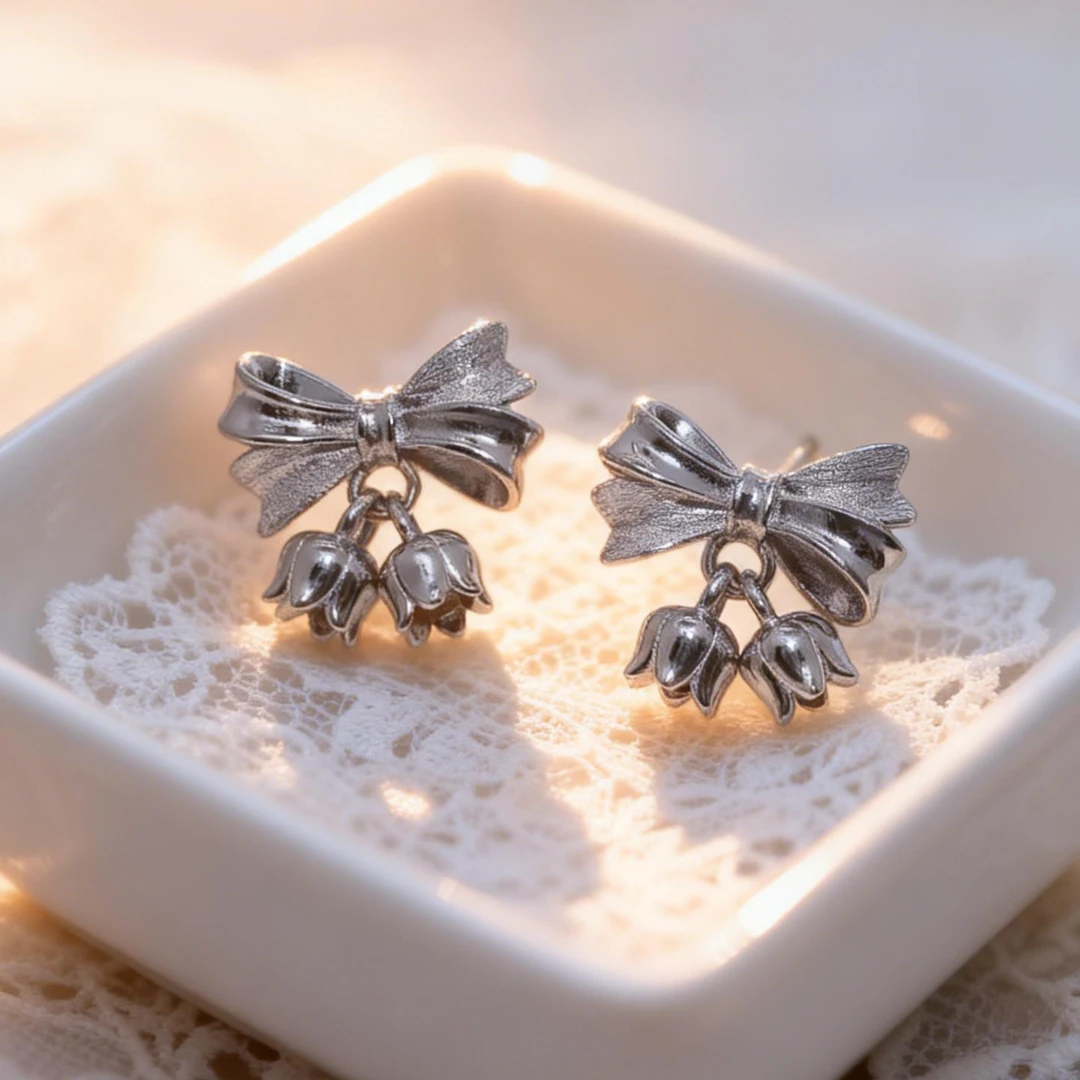 足银耳饰 S999纯银铃兰花蝴蝶结耳钉新款爆款甜美气质小众设计感