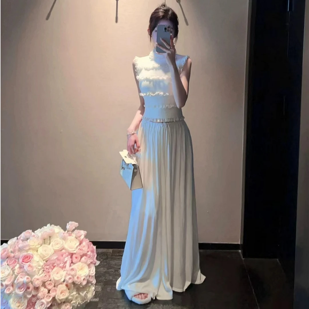 法式气质女神2025春季新款时尚木耳边拼接背心上衣搭配高腰半身裙