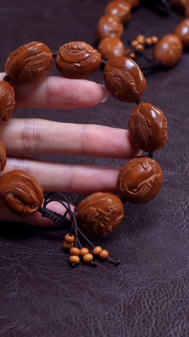 橄榄核手串/手链荷花鱼