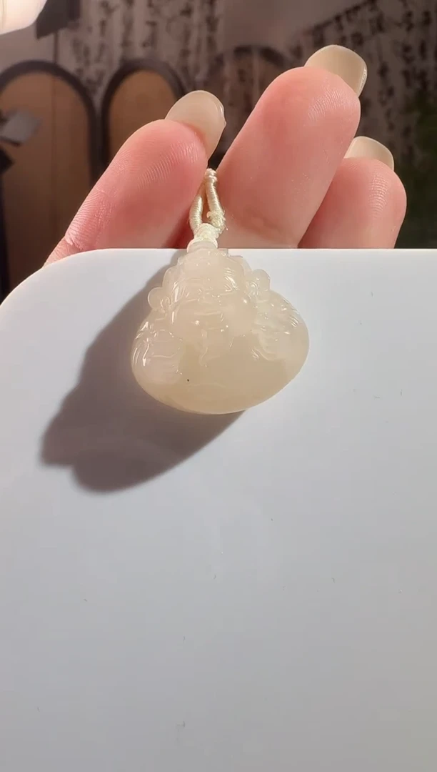 和田玉未镶嵌颈饰藕粉财神