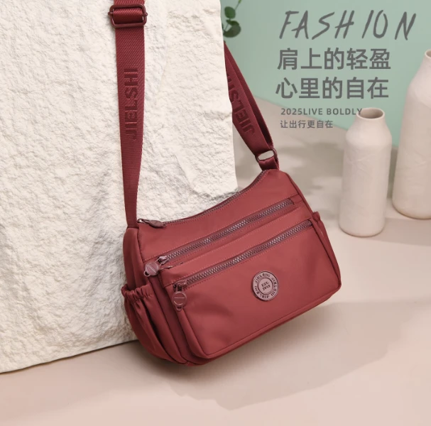 尼龙防水帆布包女休闲大容量多口袋单肩包2025新款旅行斜挎牛津布