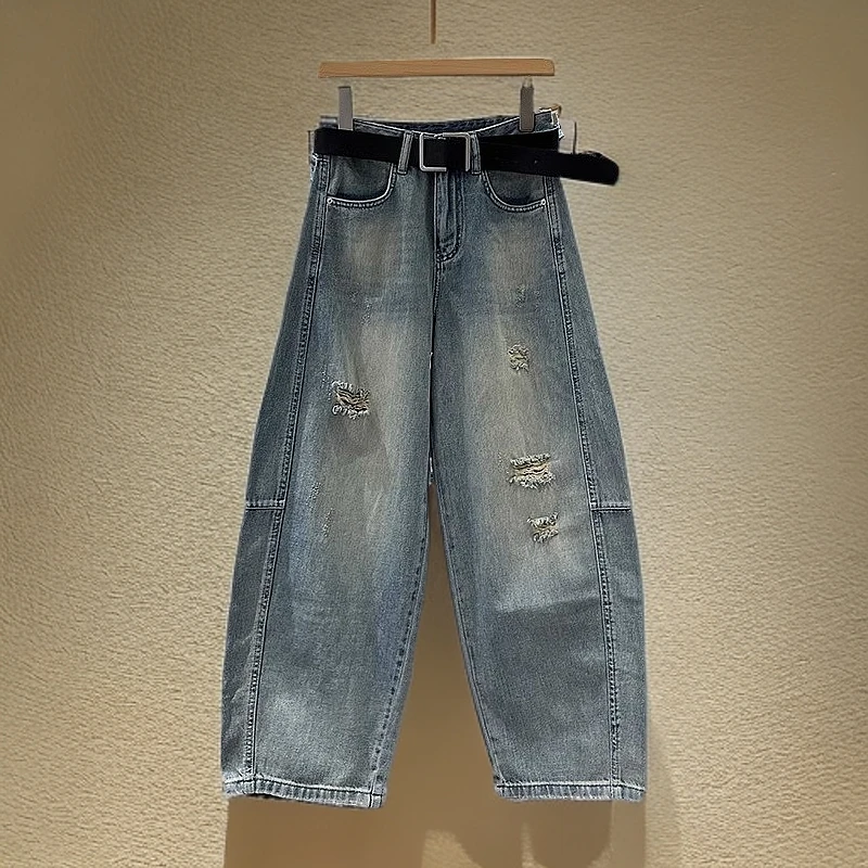 时尚慵懒百搭弯刀牛仔裤女2025春夏新款浅蓝色破洞阔腿牛仔裤女