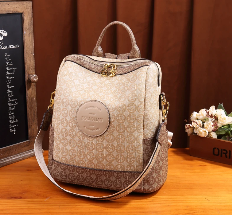 702时尚新款花色双肩包