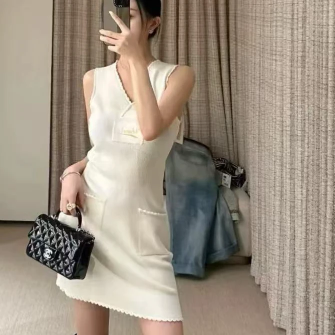 99新 Chanel/香奈儿 24K米白色徽章贴布无袖针织连衣裙 36码