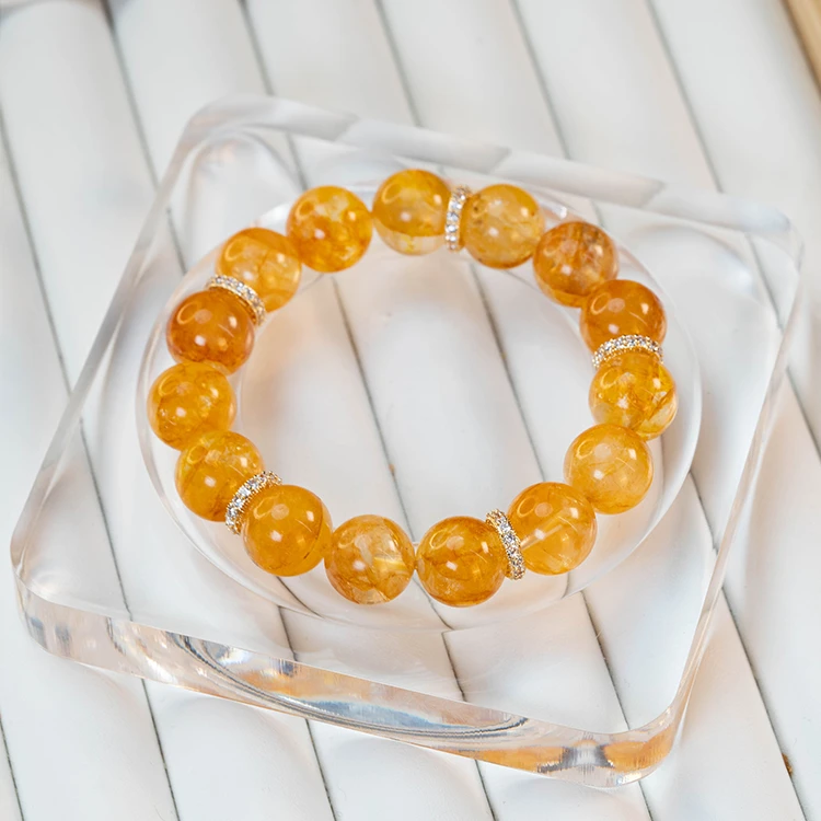 1225  【腰缠万贯】黄胶花水晶手串