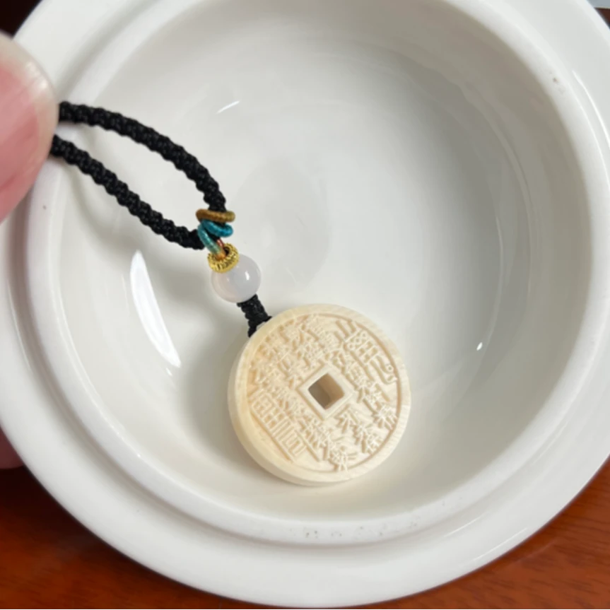 猛犸牙山鬼花钱吊坠