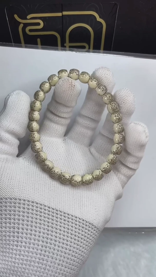 手串星月菩提小驼包8x7.c550