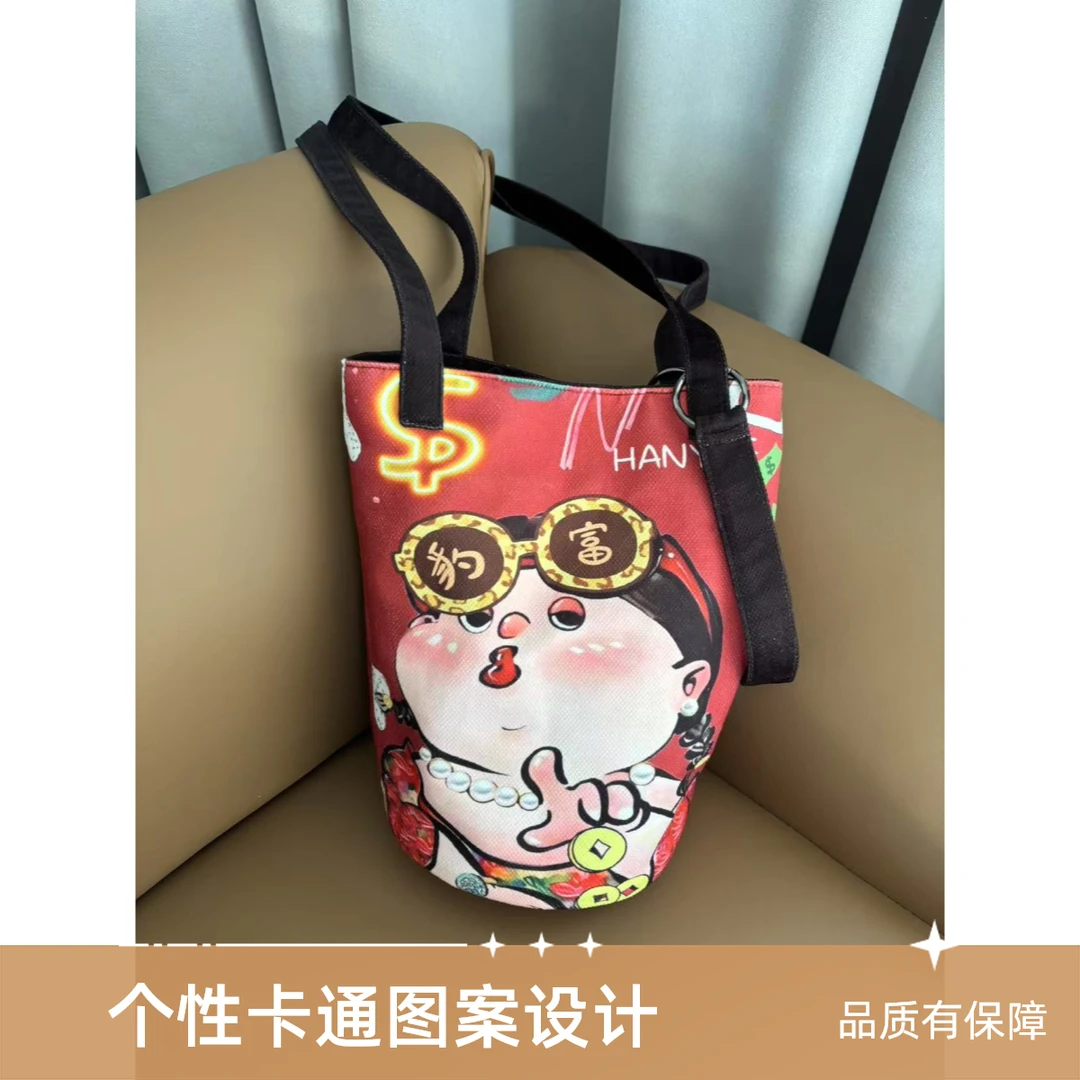 原创2025新款暴富女孩印花手提水桶包单肩包斜跨包可爱布包女