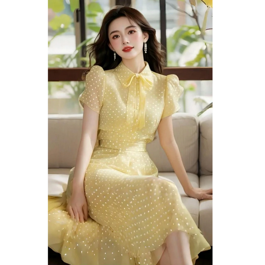 气质黄色波点连衣裙女夏季2025新款多巴胺漂亮独特小众法式裙子