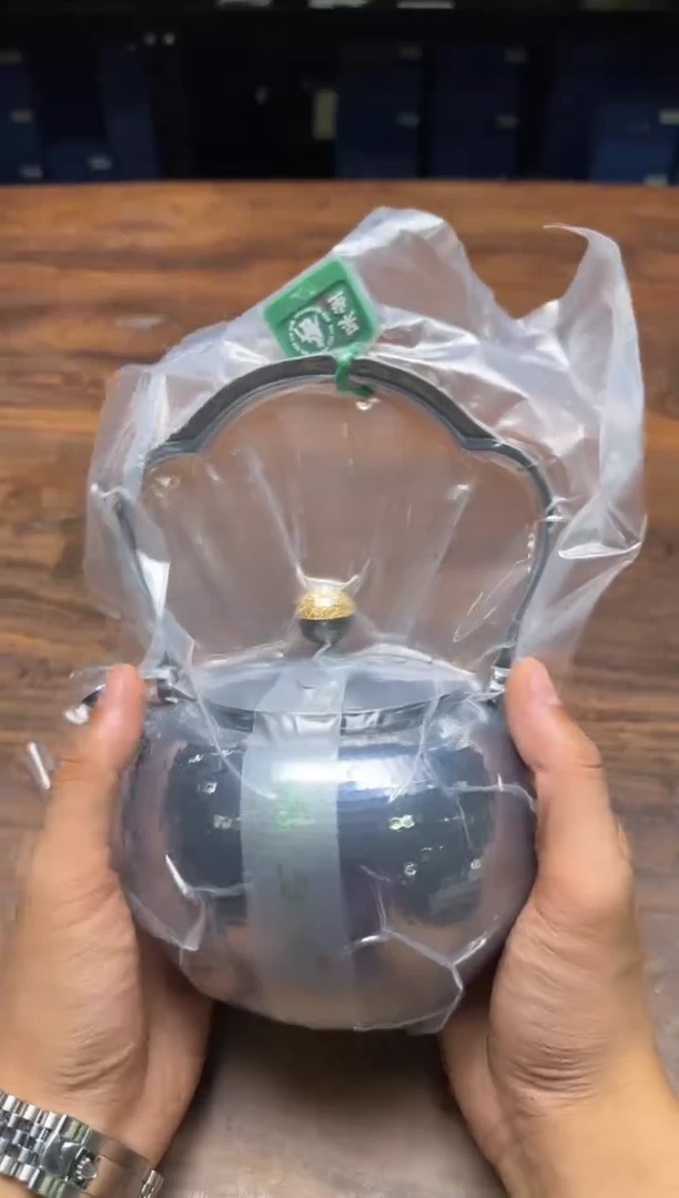呆坐 整敲锤纹玄紫如意提梁壶