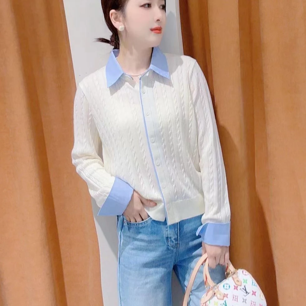 欢欢 小美女自留款假两件上衣均码229