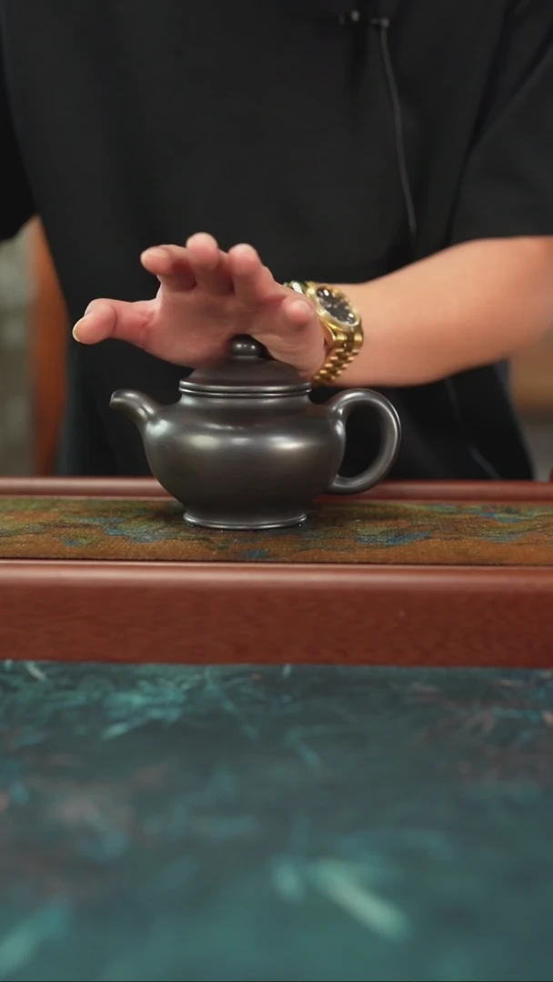 茶杯紫砂6.7   玄铁 石黄   掇只壶