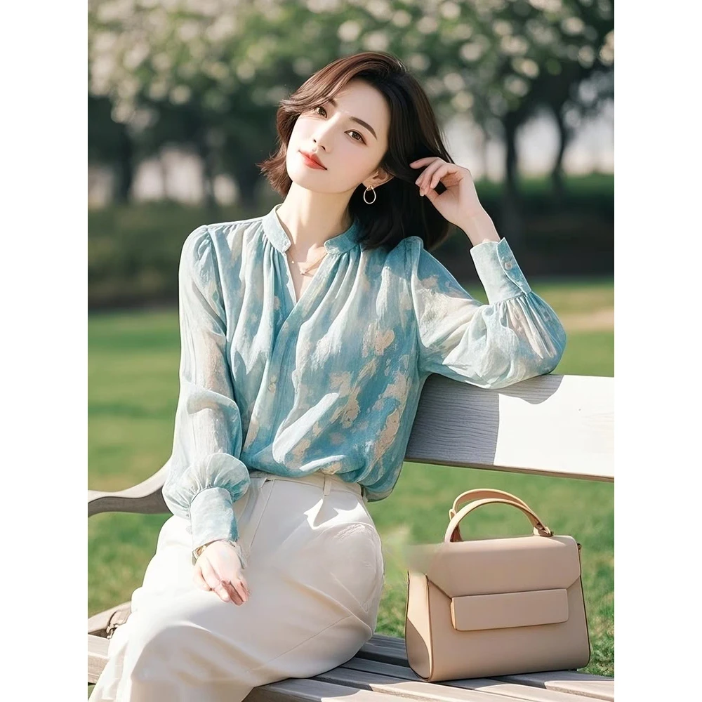 开春独特漂亮小衫设计感绿色碎花长袖衬衫法式洋气独特别致上衣女