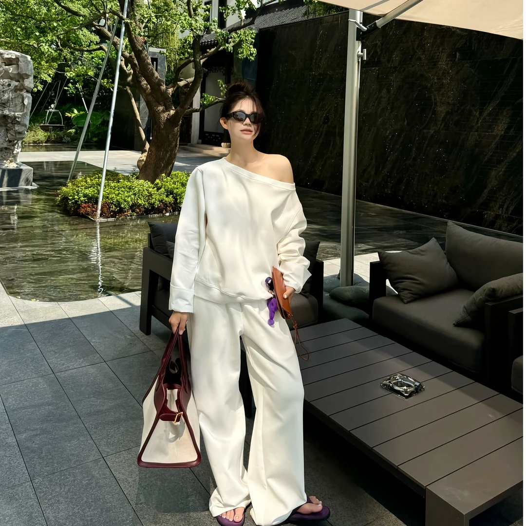 慵懒风时尚简约套装女秋松弛感休闲宽松一字肩上衣显瘦卫裤两件套