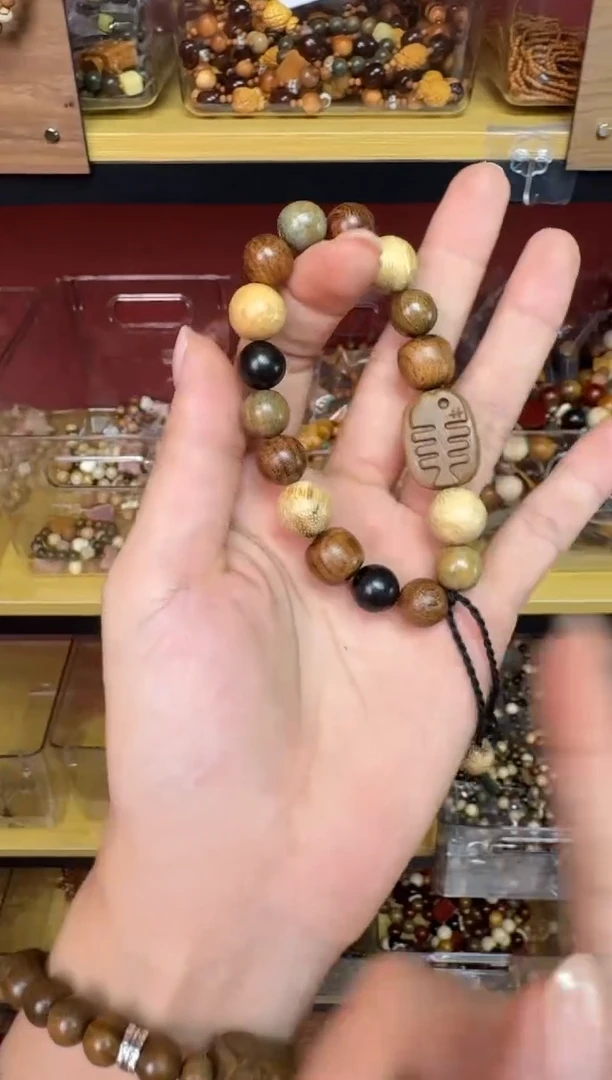 非洲檀香无事牌005年年有余单圈