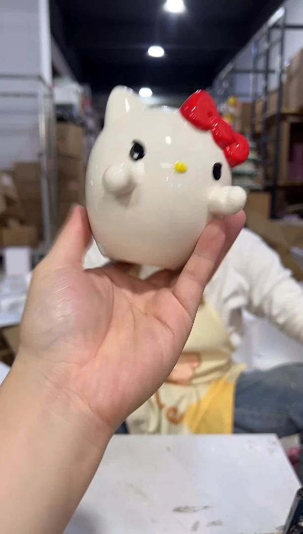 瓷片kt猫阿飘花插摆件微瑕