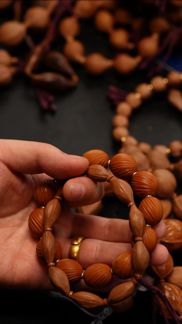 橄榄核吊坠尔**难橄榄核