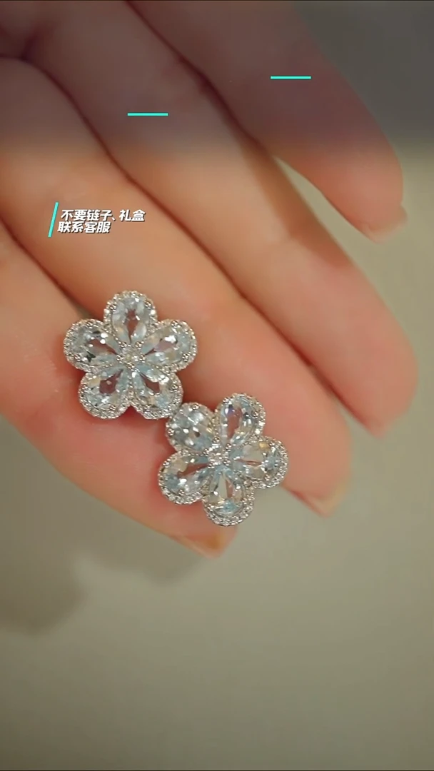银S925镶嵌耳钉海蓝宝石喵****i花朵耳钉