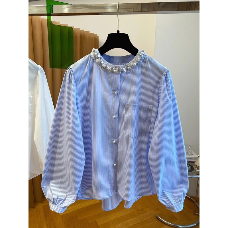 欧货高级感显瘦百搭蓝色条纹衬衫女春2025新款宽松圆领珍珠扣上衣
