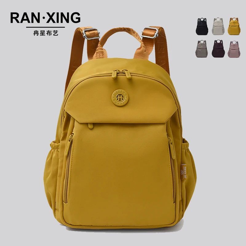 多隔层轻便防水旅行双肩背包女2025爆款文艺风通勤妈咪包简约书包