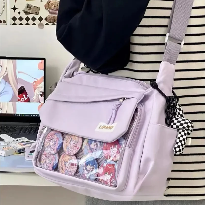 百搭小众学生单肩斜挎包女系学院时尚小少女吧唧透明娃包痛包V407