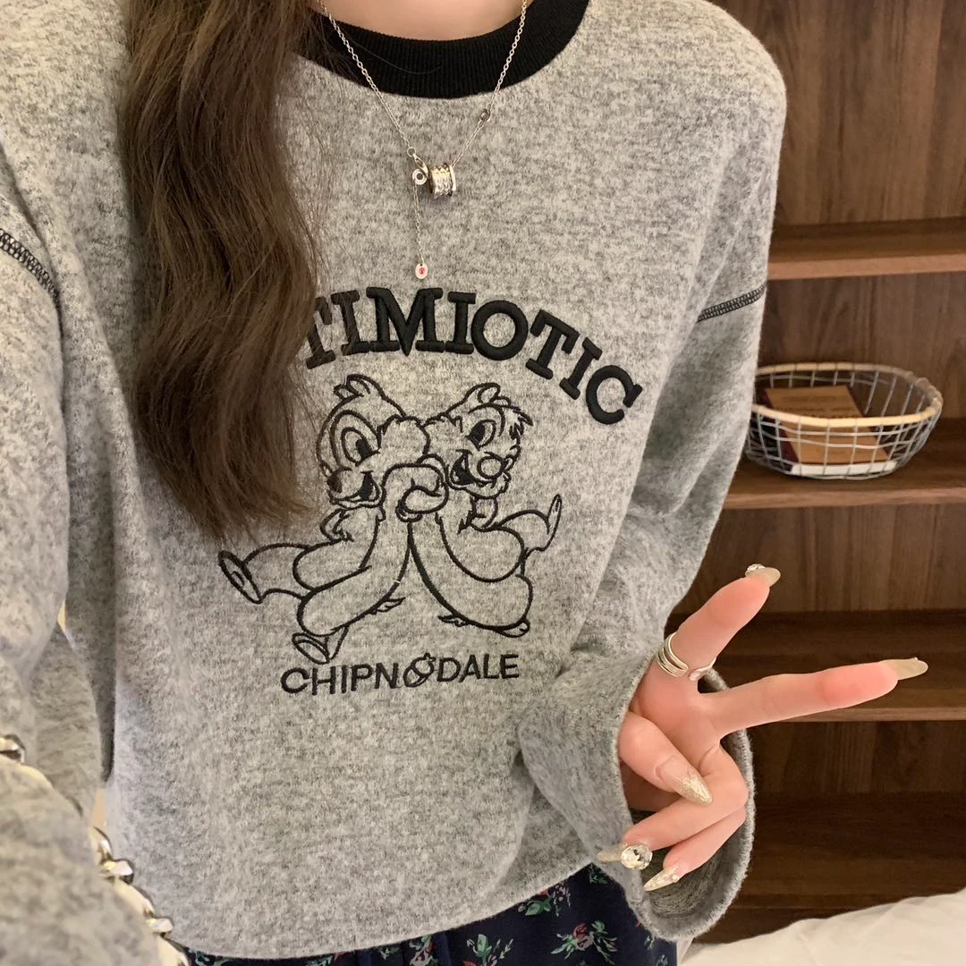 U家春款奇奇蒂蒂撞麻丝线长袖t