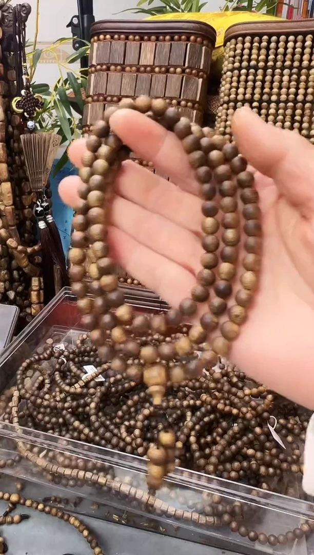 沉香手串棋楠乌身圆珠多圈