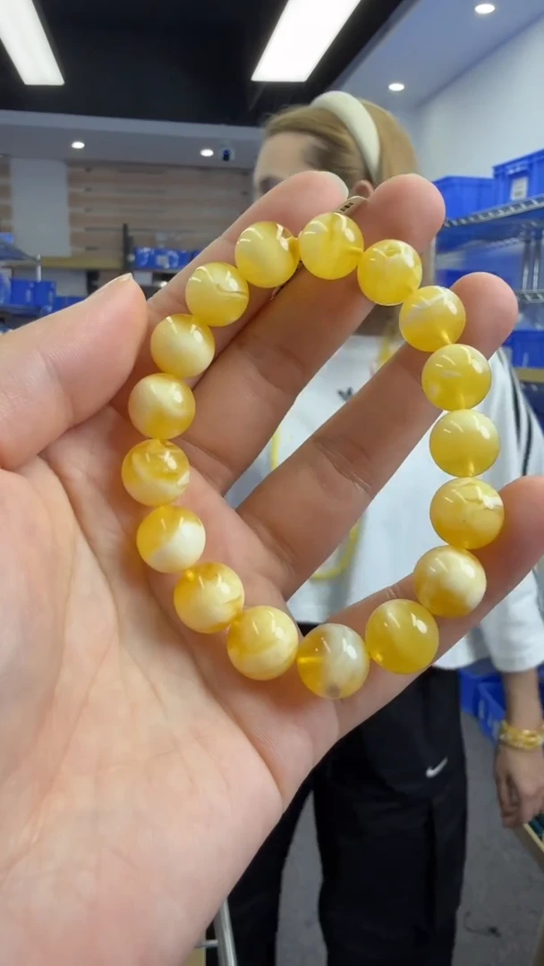 未镶嵌琥珀手链82秒拍号 假一罚三