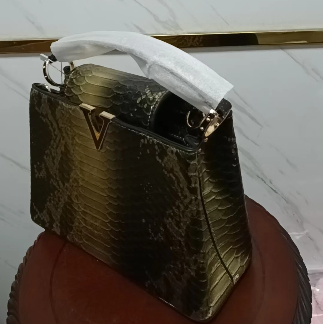 时尚潮流女款黑金款手提包10079金色气质百搭涛