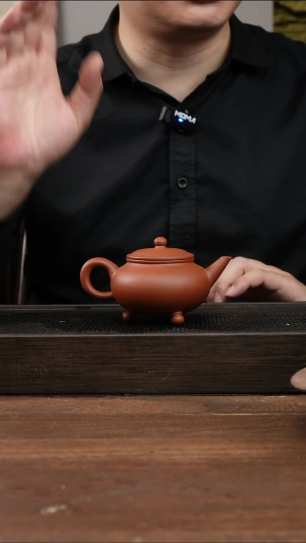 茶杯紫砂红清水三足水平     180CC