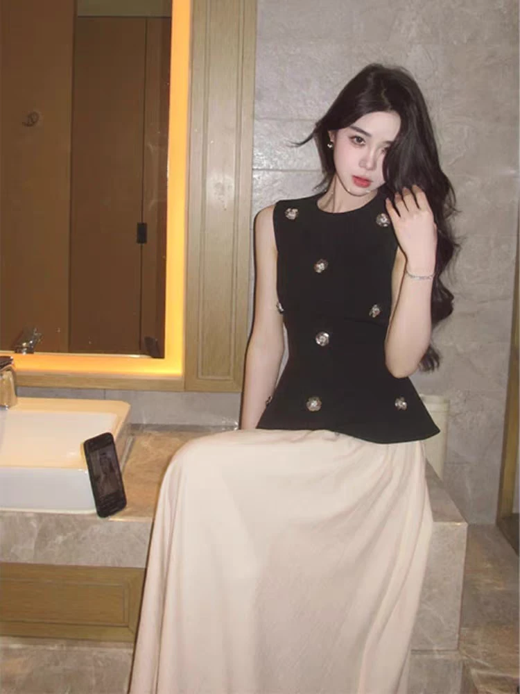 夜影花语2025春夏季新款无袖黑色背心上衣修身气质收腰半裙套装女