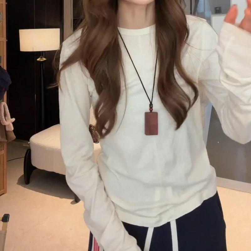 秋冬新款韩系温柔白杏色亲肤贴身万能打底长袖T恤LK2509068