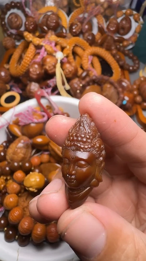 手串橄榄核观音单子说说是是