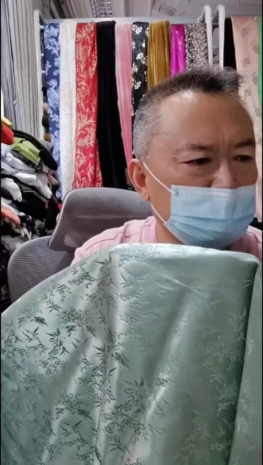 淡绿色繁花织锦缎布料