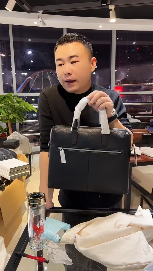 头层牛皮韩爵绅士包包皮具921