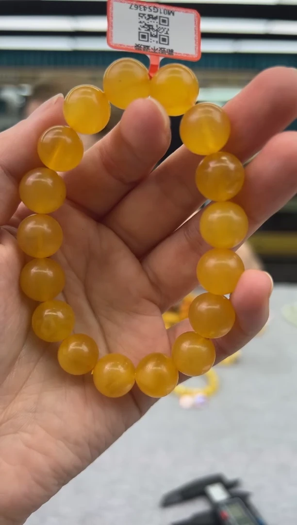 未镶嵌琥珀手链215秒拍号 假一罚三