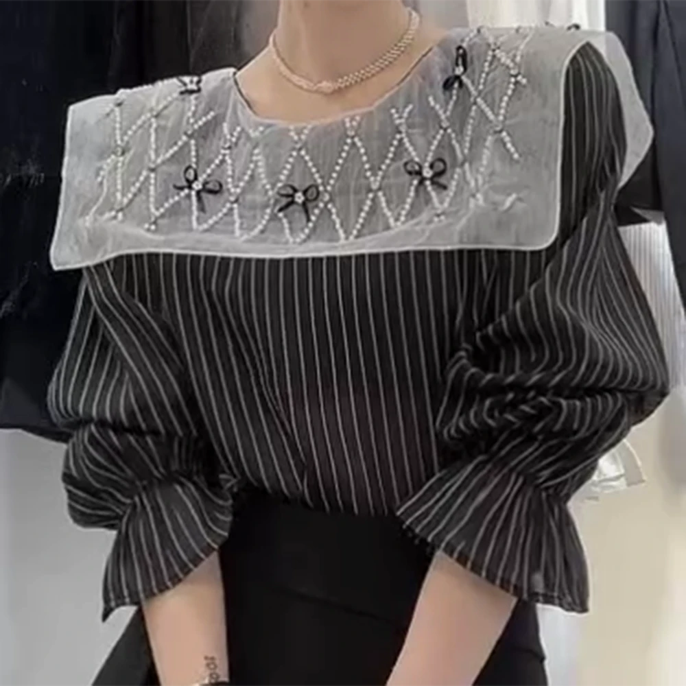 早春时尚设计感小众法式显瘦衬衫长袖百搭气质圆领洋气衬衣