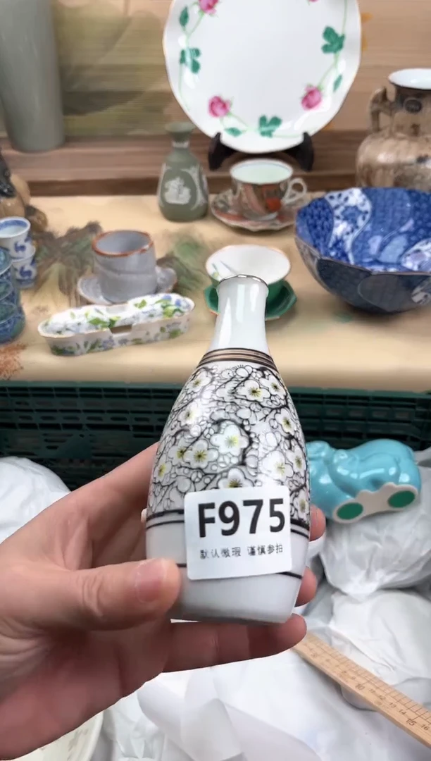 瓷片麒*哥975