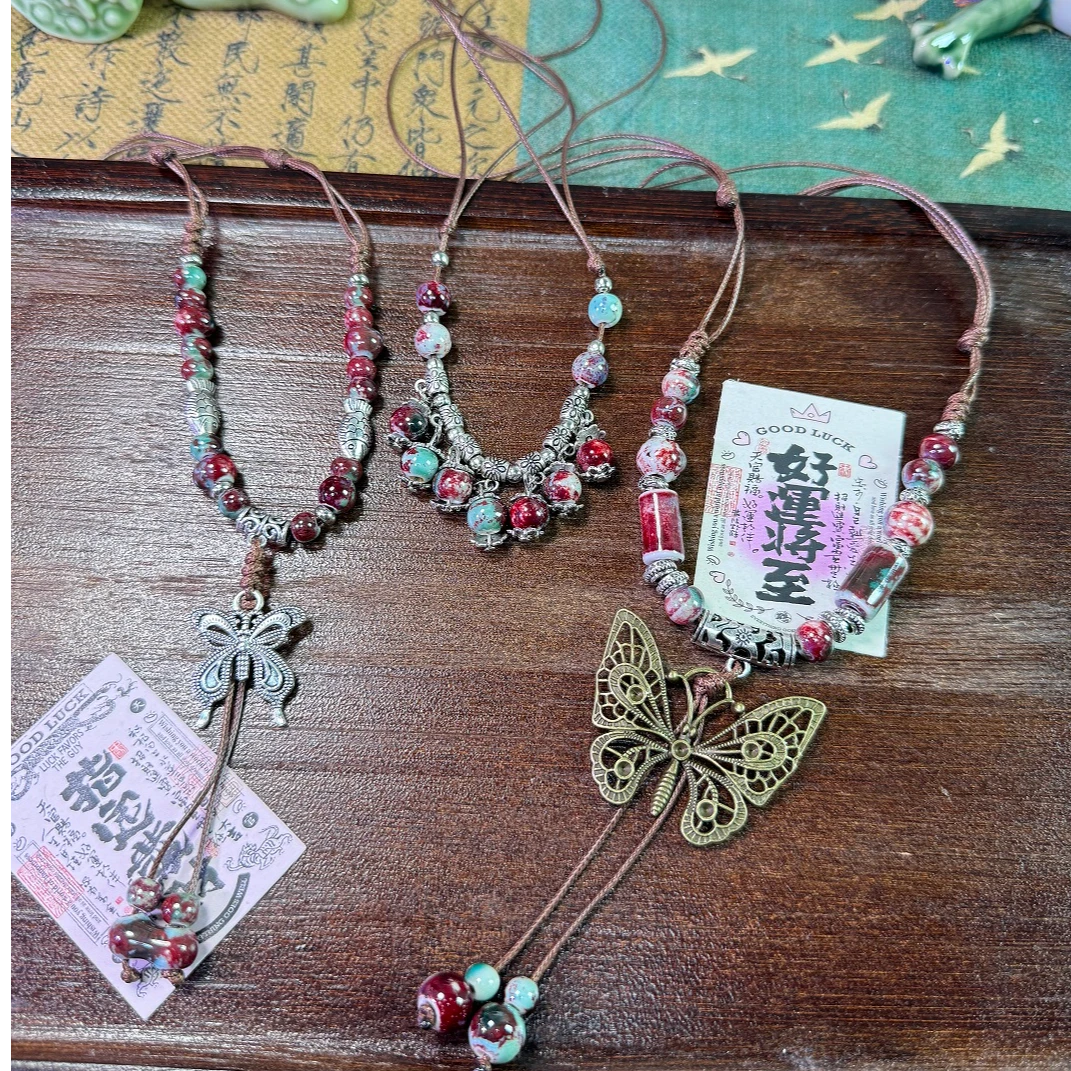 复古民族风陶瓷蝴蝶铃铛吊坠项链女潮长款毛衣链配饰品