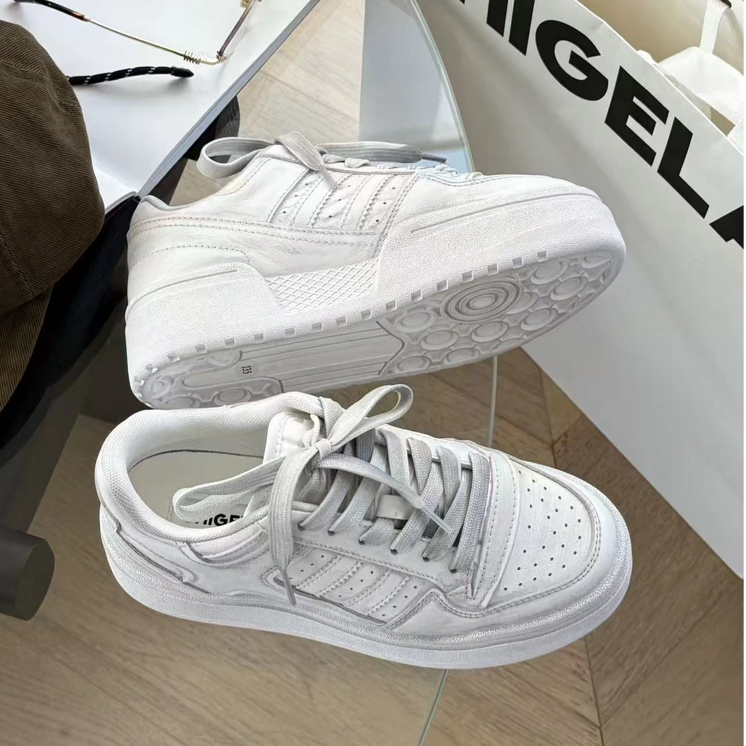 诗歌兰真皮女2025秋新款时尚百搭厚底增高系带休闲运动板鞋小白鞋